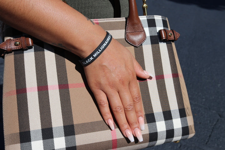 Black Millionaires Wrist Bands