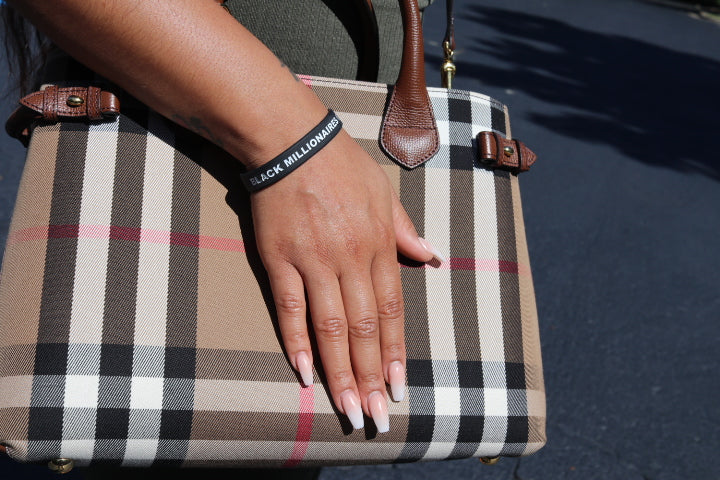 Black Millionaires Wrist Bands